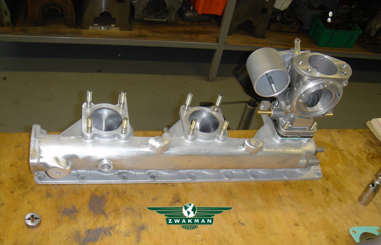 Jaguar inlet manifold and carbs.